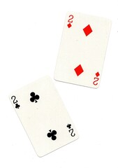 A pair of playing cards of the same value isolated on a white background.