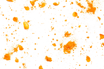 Turmeric powder scattered lightly on a seamless white background, ideal for food styling.