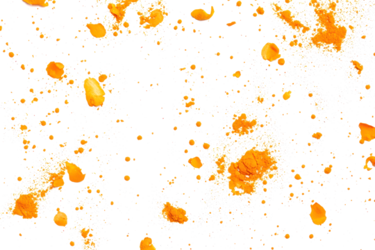 Turmeric powder scattered lightly on a seamless white background, ideal for food styling.