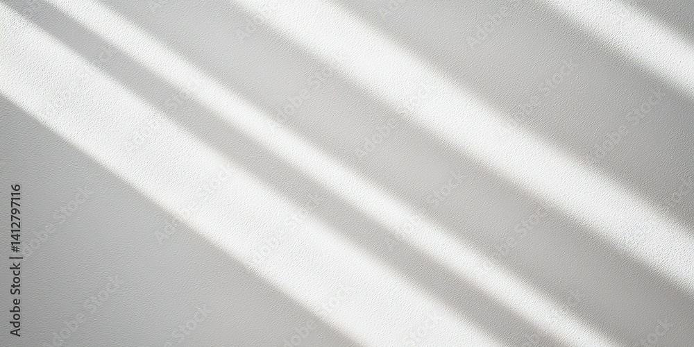Poster a serene abstract image featuring soft light and shadows on a textured gray surface, creating a calm