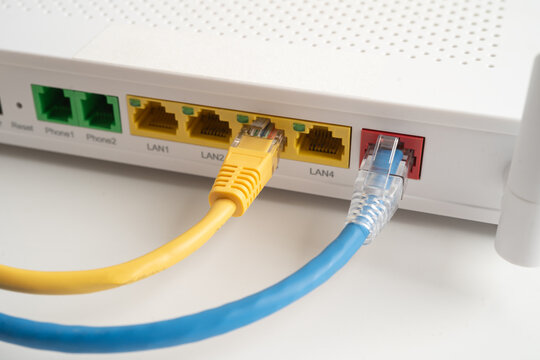 Ethernet cable with wireless router connect to internet service provider internet network.