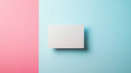 Blank white card on a flat surface, symbolizing simplicity and clarity in design.