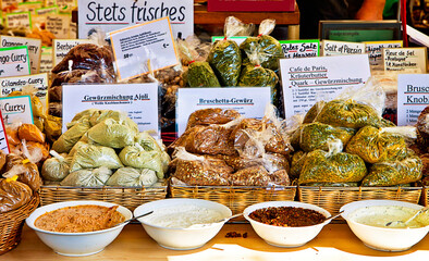 Dry spices for sauces and dressing ready to buy and to taste at market stall