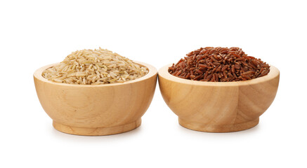 Different sorts of raw brown rice isolated on white