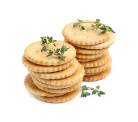 Tasty salty crackers with thyme isolated on white