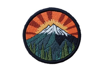 Mountain and sun embroidered patch on white background 