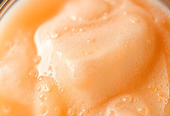 Fototapeta premium close up of a glass of orange juice