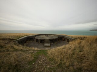Abandoned remains of Taylor battery historical military defence gun emplacement at Godley Head Farm Park near Christchurch Canterbury New Zealand