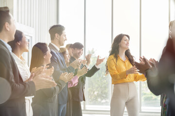 Business people applause for success, achievement and winner motivation in office conference. Colleagues, Corporate, employees cooperate. Unity, cooperation and teamwork and team congratulations