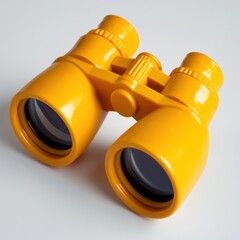 Close up view of bright yellow binoculars isoleted on white background