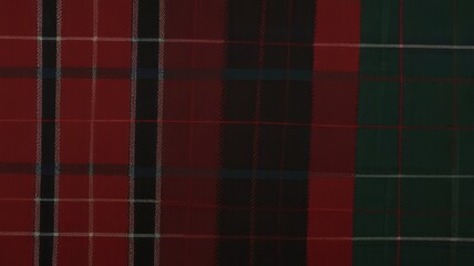 Red and green plaid fabric texture, close-up