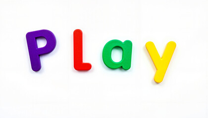 Colorful plastic letters spelling "PLAY" on white background