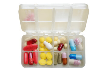 A Colorful Array of Medication: Capsules and Tablets in a Pill Organizer, Providing a Visual Representation of Daily Health Management