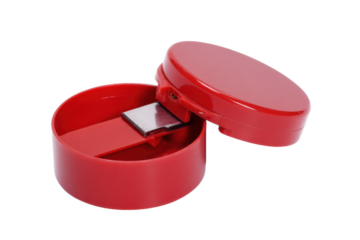 Crimson Container: A macro shot of a vibrant red, plastic container with a sliding, metallic component, offering a glimpse into a world of minimalist design and function.