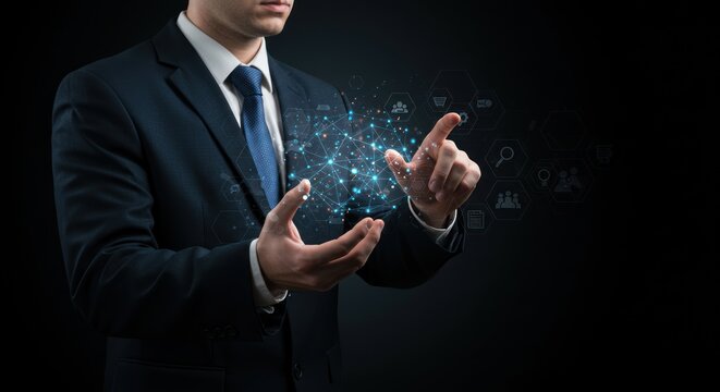 Man in suit interacts with digital data stream against a dark background.
