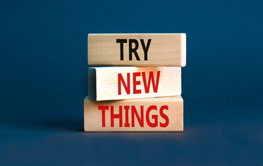 Try new things symbol. Concept words Try new things on beautiful wooden block. Beautiful grey table...