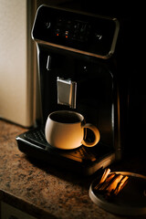 Freshly brewed coffee awaits in a cozy kitchen corner during the morning hours