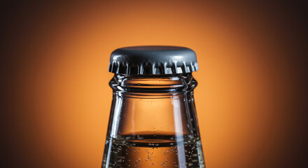 Sparkling beverage bottle top close up view amber background refreshing drink detailed cap