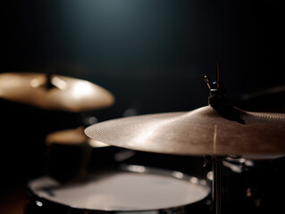 Obraz premium small jazz drum kit under dim spotlight creates moody vibe