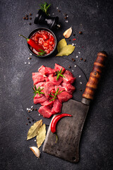 Raw beef meat and ingredients for cooking