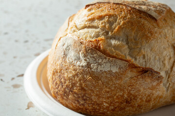 A view of a rustic sourdough loaf.