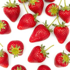 Fresh ripe red strawberries scattered on a white background showcasing their vibrant color and juicy texture perfect for food blogs and packaging.