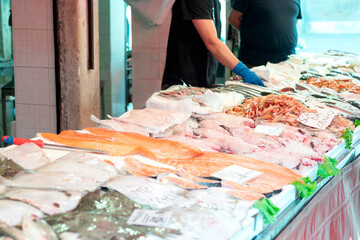 Fresh seafood display at a fish market.