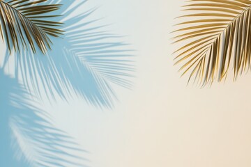 Fototapeta premium Light and shadow dance of palm leaves on a smooth pastel background