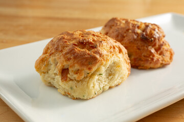 A view of some biscuits, on a plate.