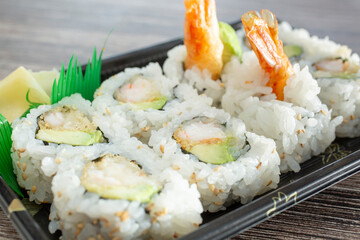 A closeup view of a shrimp tempura roll.