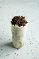 A view of a matcha cookie crumb brulee drink.