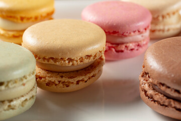 A closeup view of some macaron cookies.