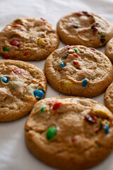 A view of several chocolate candy cookies.