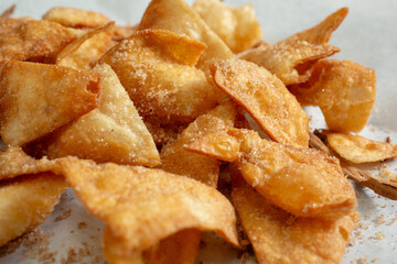 A closeup view of a pile of bunuelos.