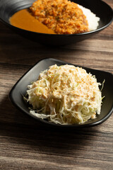 A view of a small plate of Japanese slaw.,