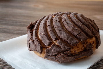 A view of a chocolate concha.