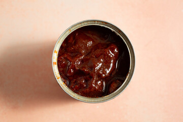 A top down view of canned chipotle chile in adobo sauce.