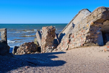 Ruins of coastal artillery in Liepaja. Ruins of military history.