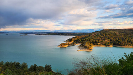 At rainy April dawn, Seyhan Dam Lake in Adana gifts unforgettable memories to its visitors.