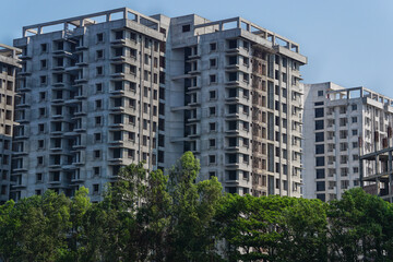 Obraz premium Commercial and residential property development in Bangladesh (Under construction buildings) 