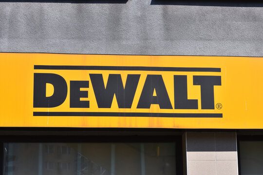 DeWALT logo, emblem, signage on the facade. Power tools and hand tools store. WARSAW, POLAND - APRIL 13, 2025