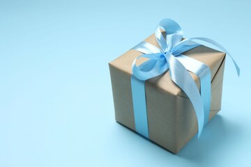 Beautiful gift box on color background