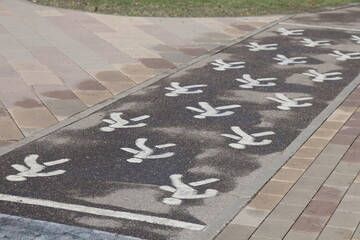marking of pedestrian path in park, public park, Moscow, April 16, 2025, 2