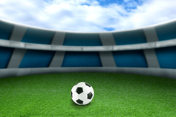 Soccer ball on green grass at football stadium