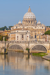 Fototapeta premium St Peter's basilica in Vatican and Victor Emmanuel II bridge in Rome, Italy.