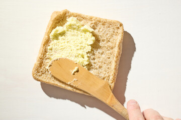 bread slice with whipped butter smear