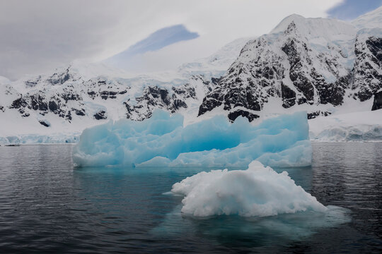 Southern Ocean, Antarctica. Paradise Bay is filled with brash ice and larger icebergs.