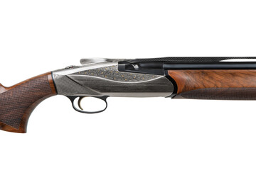 Close-up of engraved over-under shotgun receiver with wooden stock and metal detailing