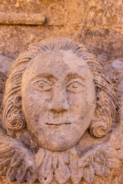 Greece, Crete, Akrotiri. Agia Triada (Holy Trinity) Monastery. Face carved in stone.