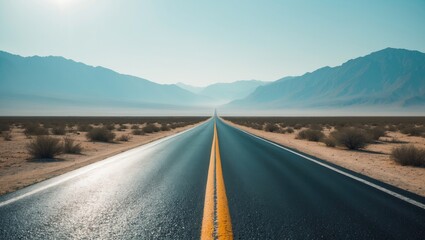 Fototapeta premium Straight pathway leading to mountain range on the horizon